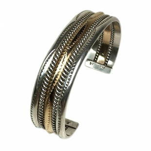 Signed TAHE Navajo Cuff: This is an artist signed "TAHE" Navajo traditional cuff with a twisted rope design. It's stamped sterling and 12K gold filled. Dimensions: 0.625 width and adjust to fit. Reserve: $135.00 