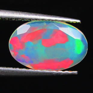 0.84 Ctw Natural Ethiopian Multicolor Opal Oval Cut: No Reserve! Title: 0.84 Ctw Natural Ethiopian Multicolor Opal Oval Cut Stone Clarity: Translucent Gemstones: Natural Opal Carat Weights: 0.84 Size/Dimensions: 10.40 x 6.80 x 2.70 mm Additional Informa