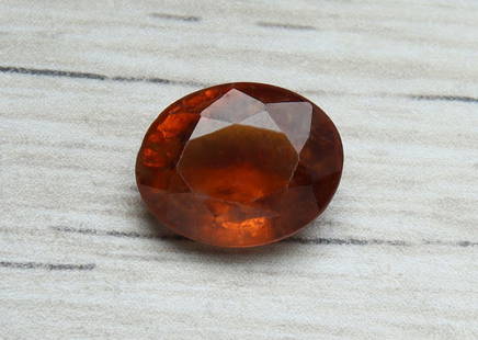 Gorgeous ' Natural 3.00 Cts Natural Hessonite Garnet: No Reserve! Title: Gorgeous ' Natural 3.00 Cts Natural Hessonite Garnet Additional Information: Gemstone : Natural Hessonite Garnet Shape and cut : Oval Cut Origin : Brazil Weight : 3.00 carats Measur