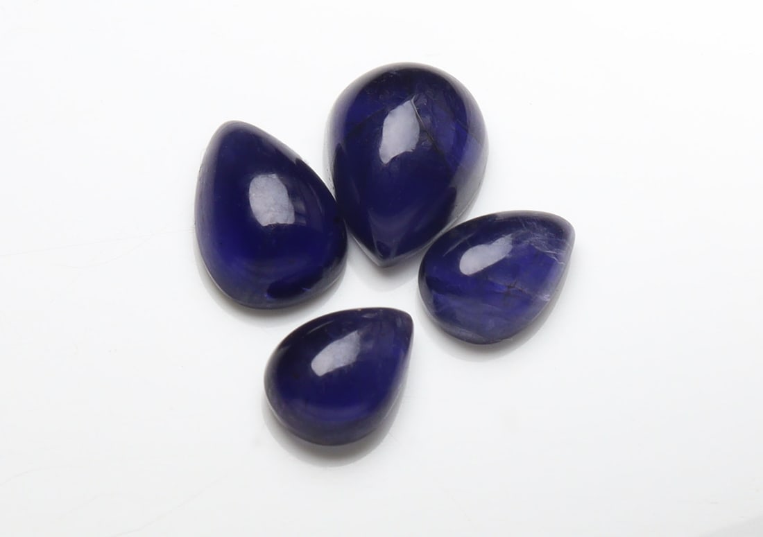 Beautiful " Natural Iolite Violet " 5.47 Cts Natural Iolite Lot: No Reserve! Title: Beautiful " Natural Iolite Violet " 5.47 Cts Natural Iolite Lot Additional Information: Gemstone : Natural Iolite Shape and Cut : Pear Cabochon Weight : 5.47 Carats Measurements : 9