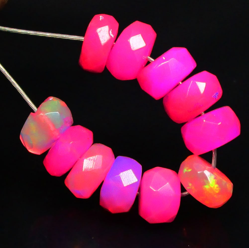 3.30 Ctw Natural 11 Pink Fire Opal Beads: No Reserve! Title: 3.30 Ctw Natural 11 Pink Fire Opal Beads Stone Clarity: Transcluent Gemstones: Natural Opal Beads Carat Weights: 3.30 Size/Dimensions: 4.50 - 5.00 mm / 11 P'cs Additional Informatio
