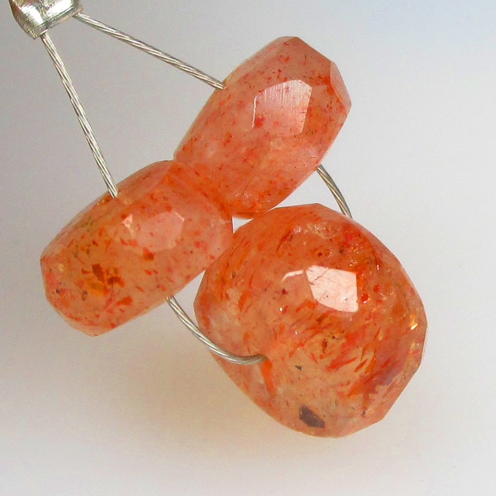 6.51 Ctw Natural 3 Drilled Orange Sunstone Round Beads: No Reserve! Title: 6.51 Ctw Natural 3 Drilled Orange Sunstone Round Beads Stone Clarity: Opaque Gemstones: Natural Sunstone Beads Carat Weights: 6.51 Size/Dimensions: 6.90 - 8.90 mm / 3 P'cs Additiona