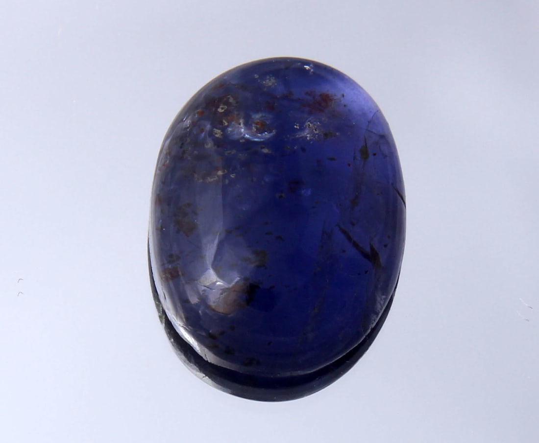 Delightful " Natural Iolite Violet " 4.73 Cts Natural Iolite: No Reserve! Title: Delightful " Natural Iolite Violet " 4.73 Cts Natural Iolite Additional Information: Gemstone : Natural Iolite Shape and Cut : Oval Cabochon Weight : 4.73 Carats Measurements : 14.6