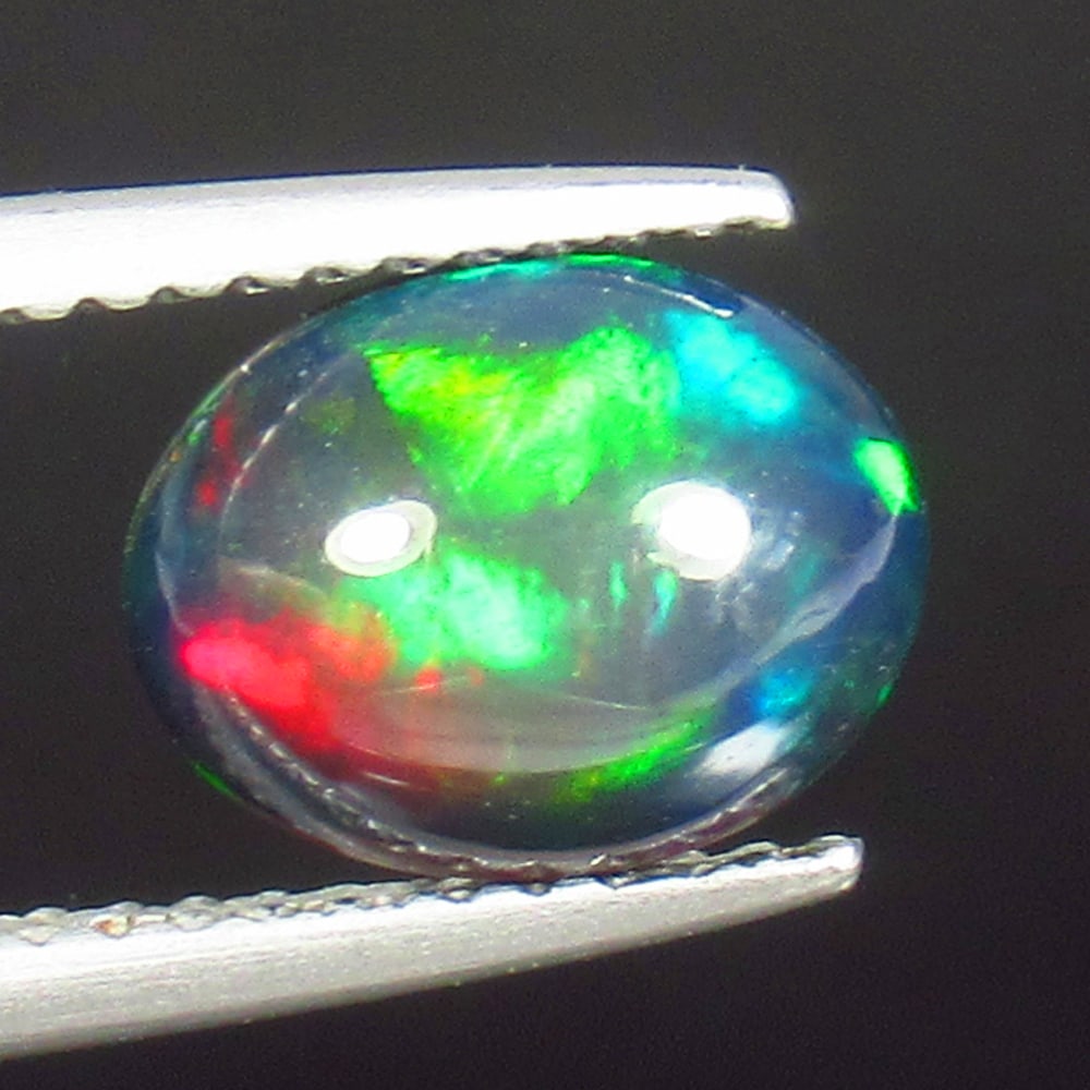 1.18 Ct - Natural Black Fire Opal (1 of 2)