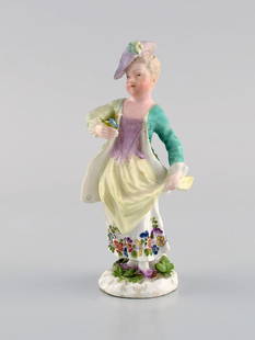 Meissen, Germany. Antique hand-painted porcelain figure. Lady with flowers. Late 19th century.: Meissen, Germany. Antique hand-painted porcelain figure. Lady with flowers. Late 19th century. Measures: 12 x 5.5 cm. In excellent condition. Minimal cut on flower. Stamped. Reserve: $259.00 