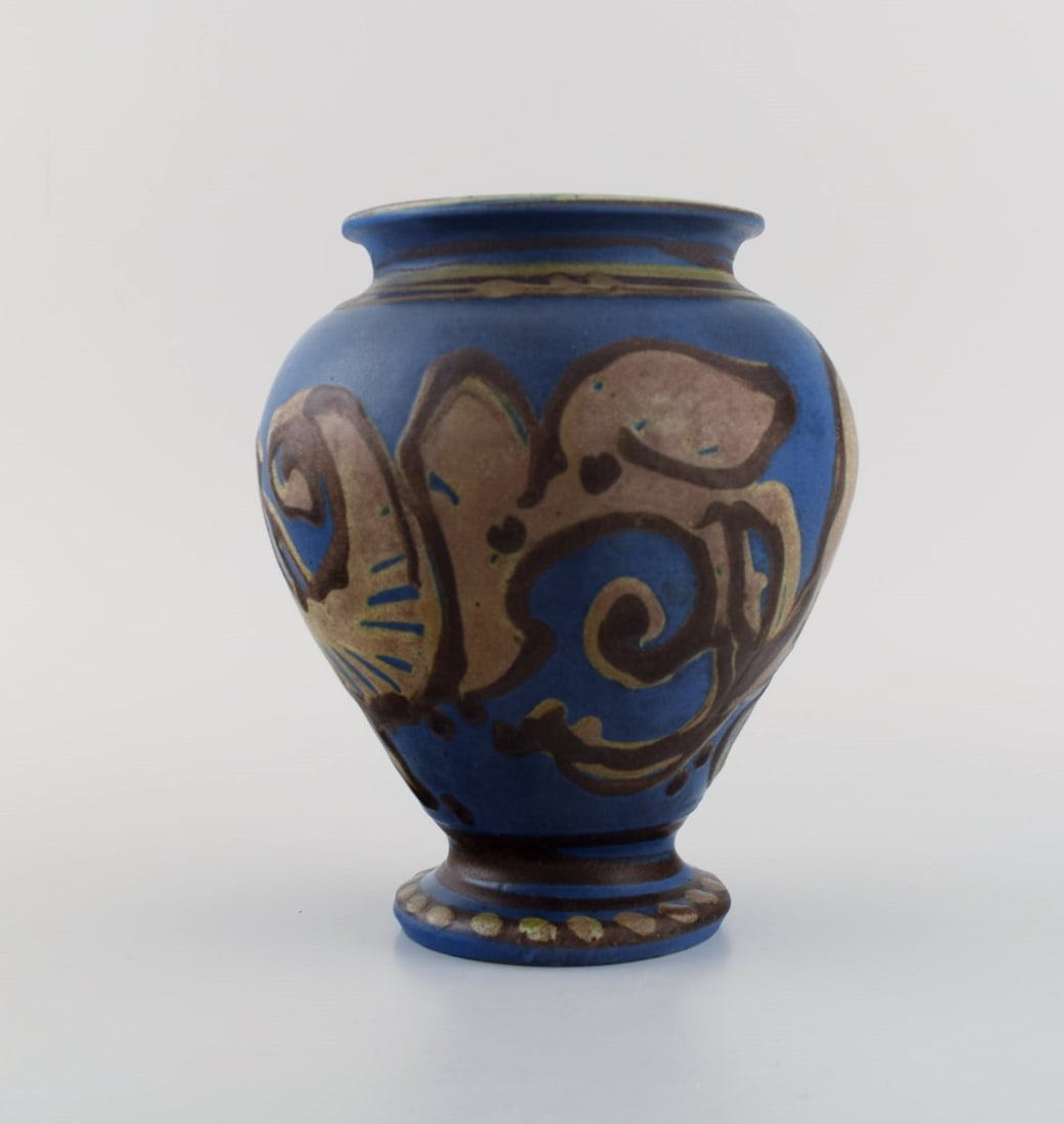 Kähler, Denmark. Glazed stoneware vase in modern design. Brown foliage on blue background. (1 of 6)