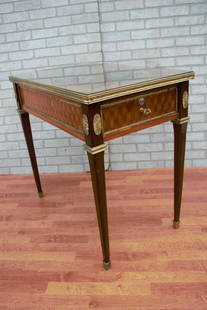 French Louis XVI Style Cubed Parquetry with Ormolu Side Table: Vintage from before 2000 Materials: walnut, mahogany, metal, brass, wood Description French Louis XVI Style Mahogany and Walnut Cubed Parquetry with Brass Ormolu Side Table The clean and classical des