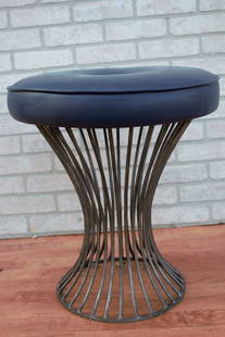Made Goods Roderic Round Stool: Materials: metal, iron, leather Description Made Goods Roderic Round Stool he Made Goods Roderic Round Stool in Silver is the perfect size and design for any room. This modern stool has a wire frame b