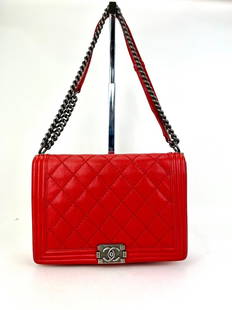 CHANEL Handbag Calfskin Quilted Double Stitch Large Boy Flap Red B509: SKU B509 0622 Pre-Owned 100% Authentic CHANEL Calfskin Quilted Double Stitch Large Boy Flap Red RATING: B...Very Good, well maintained, shows minor signs of wear MATERIAL: lambskin leather HANDLE: