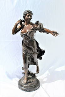 Art Deco Lady bronze , Title ( in the wind ) after artist L.Charpenter .Marble b: An elegant Lady in full dress with some shin showing . Her name is ( Brise ) , Has multi-patinas and mounted on marble base . Medium size figurine at 27" ht and 14" wide . Heavy casting made here in