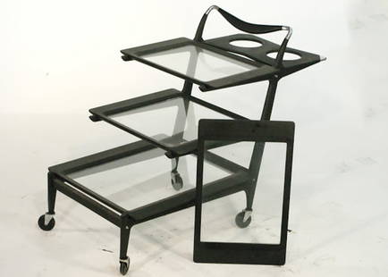 Mid-Century Italian Bar Cart by Cesare Lacca: Mid-Century Italian Bar Cart by Cesare Lacca This Italian Mid-Century Modern ebonized bar or tea cart by Cesare Lacca was most recently featured in Mad Men. The sculptural bar cart or tea caddy featur