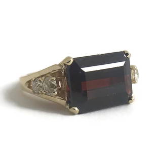 Emerald Cut Red Garnet Diamond Cocktail Ring 14K Yellow Gold, 4.38 CTW, 4.66 Gr: Emerald Cut Red Garnet Diamond Cocktail Ring 14K Yellow Gold, 4.38 CTW, 4.66 Gr This is a gorgeous statement ring! Makes a great gift as a January birthstone ring. Please let us know if you have any