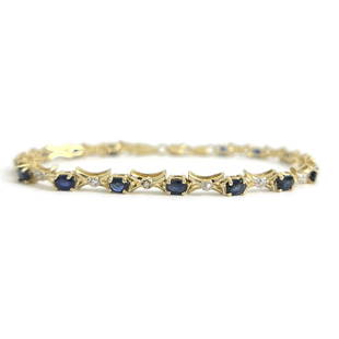 Estate Oval Blue Sapphire Gemstone Tennis Bracelet 10K Yellow Gold, 5.52 Grams: Estate Oval Blue Sapphire Gemstone Tennis Bracelet 10K Yellow Gold, 5.52 Grams This is a lovely bracelet. Please let us know if you have any questions. Sapphires: 15 oval blue sapphires, 2.70