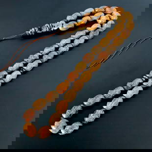 Extraordinary Amber Tesbih made from Barrel shaped Amber beads: Title: Extraordinary Amber Tesbih made from Barrel shaped Amber beads Metal: None Gemstone: Amber Weight: 69.4 g Dimensions: Bead size: 13.5 x 18.0 mm Bead size: 0.531 x 0.709 inches Made of: Reconsti
