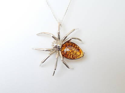 Natural Baltic Amber Gothic Spider Pendant (Brooch) Necklace: Title: Natural Baltic Amber Gothic Spider Pendant (Brooch) Necklace Additional Information: This hauntingly beautiful pendant features natural baltic cognac amber and 925 sterling silver intertwined t