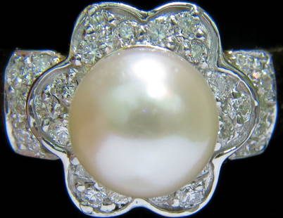 7.5mm JAPANESE CULTURED PEARL .75CT DIAMOND RING 14kt+: 7.5mm Japanese Cultured Pearl & .75ct, diamonds ring Pearl is of gorgeous white luster Diamonds: G-color, vs-2 clarity 14kt. yellow gold amazing mounting 8.9 grams 14kt. yellow gold ring is 12.4mm wid