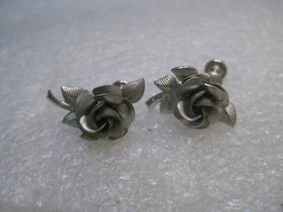 Vintage Sterling Silver Rose Earrings, singed A & Z, 5 grams, 1960's: Vintage Sterling Silver Rose Screw Back Earrings. They are signed A & Z and weigh 5 grams. Thy have grooved stamped leaves and satin finished blossom with a shiny finished stem. They are 3/4" long