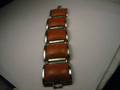 Vintage Gold Tone Wide Burnt Orange Leather Link Bracelet, 1970's, 7" - Boho Appeal Too!: Vintage Gold Tone Wide Burnt Orange Leather Bracelet, 7" long and 1.25" wide. It has 5 framed links - gold tone framing with a center of textured burnt orange leather. This has a 1960's look to it but
