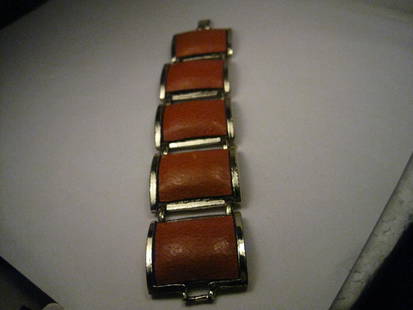 Vintage Gold Tone Wide Burnt Orange Leather Link Bracelet, 1970's, 7" - Boho Appeal Too!: Vintage Gold Tone Wide Burnt Orange Leather Bracelet, 7" long and 1.25" wide. It has 5 framed links - gold tone framing with a center of textured burnt orange leather. This has a 1960's look to it