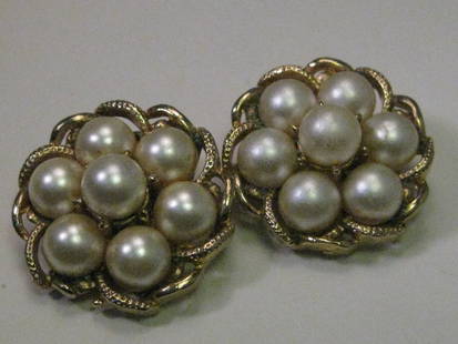 Vintage Gold tone Coro Gold Tone Faux Pearl Clip Earrings: Vintage Jewelry - vintage clip earrings, faux pearl, signed Coro. 1960's. They are tiered with 7 pearls in each earring and a scalloped border - sort of a round next design with the center faux pearl