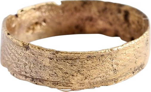 ANCIENT VIKING WEDDING RING, SIZE 7: Late 9th-early 11th century AD. Gilt bronze, size 7. Broad band 5.0mm, with raised edges and high raised central lattice band. Surface textured from burial. Professionally refurbished with a 24karat g