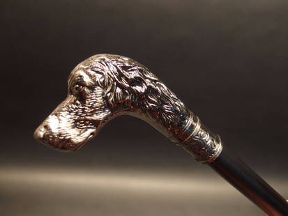 Spaniel Dog Head Handle Metal Walking Stick Cane: Vintage Antique Style Gun Handle Metal Walking Stick Cane Description 36 1/2" Long Wonderful reproduction walking cane, The handle is all metal with a hollow metal shaft, nice and lightweight. Nice qu