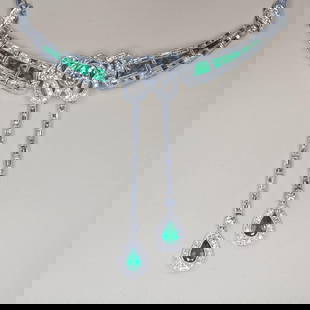 Original Art Deco Platinum Diamond and Emerald Necklace: Description This is an authentic vintage necklace handmade in the Art Deco Era Circa 1920. This necklace centers one old European cut diamond of H color and VS1 clarity that weighs 0.72ctw. It also fe