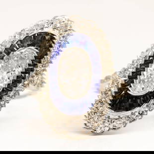 Platinum Antique Moval GIA Diamond & Calibrated Sapphire Engagement Ring: Platinum Antique Moval GIA Diamond & Calibrated Sapphire Engagement Ring Description The Mila ring is a handmade engagement ring. It centers one antique oval very rare, elongated diamond of D color, S