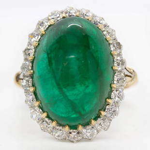 Antique 18K and Platinum Natural Emerald and Old Mine Cut Diamond Ring: Antique 18K and Platinum Natural Emerald and Old Mine Cut Diamond Ring Description The Melinda ring is an authentic vintage design. This ring centers one natural cabochon cut emerald that weighs