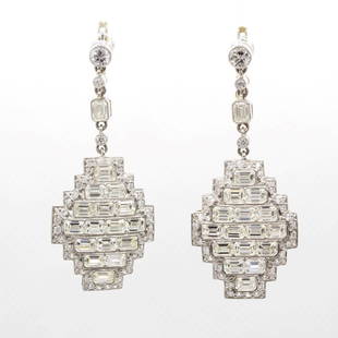 Art Deco Inspired Emerald Cut Diamond and Old Mine Diamond Platinum Earrings: Art Deco Inspired Emerald Cut Diamond and Old Mine Diamond Platinum Earrings Description The Jocelyn earrings are a handmade piece inspired by the Art Deco style. They center 2 old mine cut