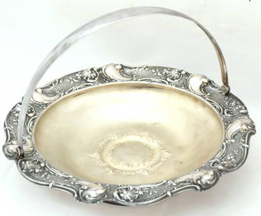 Large bowl with handle. Silver: Russian large bowl with handle. Silver marked with hallmark, 84 standard and master mark, 641 gr. Diam.28 cm, height with handle 23 cm. Dimensions: 27 × 19 cm Century: 19" Reserve: $1,550.00 Ship