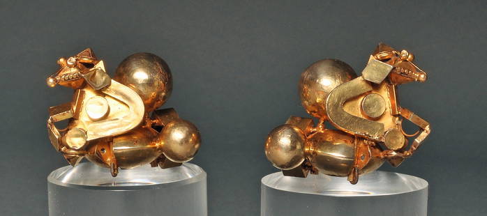India gold Pampadam Earrings: Title: India gold Pampadam Earrings Description: This pair of (Thandatti) gold ear ornaments are known as pampadam from Tamil Nadu. Hinged by unscrewing the large gold ball worn in the earlobe by wome