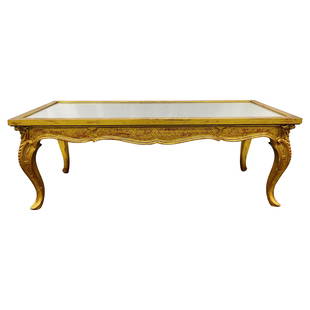 Petite Hollywood Regency Style Coffee Table, Giltwood Base, Antiqued Mirror Top: Title: Petite Hollywood Regency Style Coffee Table, Giltwood Base, Antiqued Mirror TopDescription: Petite Hollywood Regency style coffee table, giltwood base, antiqued mirror top Small wooden coffee