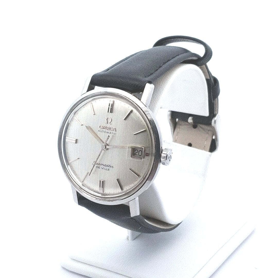 Designer $1000 Stainless Steel Omega Seamaster DeVille Automatic Watch: Title: Designer $1000 Stainless Steel Omega Seamaster DeVille Automatic Watch Additional Information: Designer Stainless Steel Omega Seamaster DeVille Automatic Watch Watch measures 9" long Strap meas