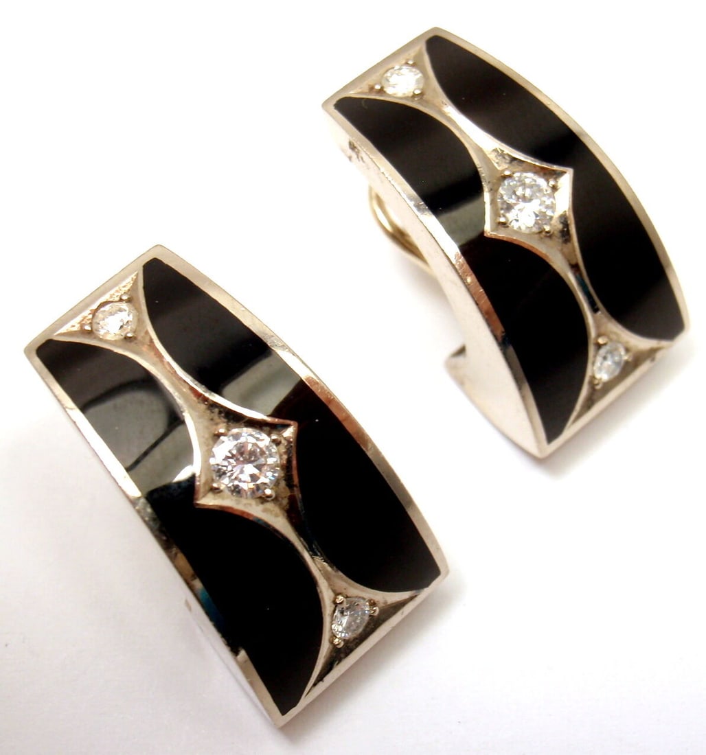 STEPHEN WEBSTER 18K WHITE GOLD DIAMOND BLACK ENAMEL EARRINGS WITH BOX: STEPHEN WEBSTER 18K WHITE GOLD DIAMOND BLACK ENAMEL EARRINGS WITH BOX STEPHEN WEBSTER 18K WHITE GOLD DIAMOND BLACK ENAMEL EARRINGS WITH BOX Product Description About This Piece: Metal: 18k white Gold