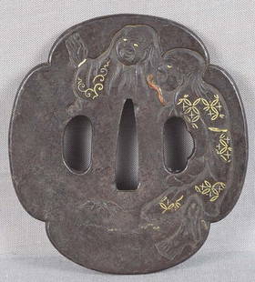 Large 18c Japanese sword TSUBA Kanzan and Jittoku: 18th century good size iron Japanese sword tsuba with decoration of Kanzan and Jittoku in conversation According to a legend, Kanzan and Jittoku lived in a kitchen of a Chinese Zen Buddhist monastery