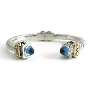 Frederic Blue Topaz Gemstone Cuff Bracelet Yellow Gold Sterling Silver, 43.50 Gr: Frederic Blue Topaz Gemstone Cuff Bracelet Yellow Gold Sterling Silver, 43.50 Gr Make a statement with this gorgeous bracelet! Please let us know if you have any questions :) Gemstones: 2