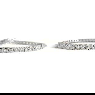 Thin Round Diamond Tennis Bracelet 14K White Gold, 3.03 CTW, 7 Inches, 12.54 Gr: Thin Round Diamond Tennis Bracelet 14K White Gold, 3.03 CTW, 7 Inches, 12.54 Gr This is such a gorgeous tennis bracelet! Please let us know if you have any questions. Diamonds: 55 round brilliant cuts