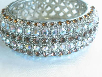Vintage but not too Silvertone & Rhinestone Wide Hinged Clamper Bracelet: Vintage but age unknown - very nice 1" wide chunky hinged clamper bracelet - with a 6.75" inside circumference and an opening of appx. 2.25" from left-to-right when closed. It is 2" from front-to-back
