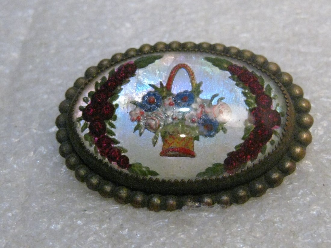 Vintage Essex Glass Floral Brooch, Pastel Basket and Red Roses, C-Clasp, Victori: Vintage Floral Basket & Rose Brooch, Essex Glass, Victorian/Edwardian, 1.5" long and 1-1/8" tall. This has a rounded glass top over a pastel basket of flowers centered under the glass with two vertica