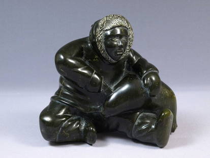 HEAVY Inuit Canada Native Man with seal Carving Stone Pauloosie Akitirq: This is a vintage Native American Eskimo Inuit Figurine. The figurine is made from soapstone and is very large beautiful. It shows an Inuit man holding a seal. It is signed at the bottom. Probably the