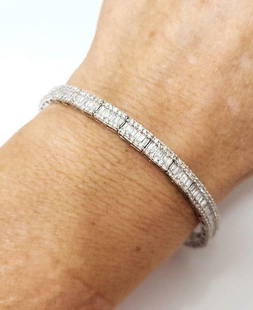5.00ct T.W. BAGUETTE & ROUND DIAMOND TENNIS BRACELET in 10K WHITE GOLD: Title: 5.00ct T.W. BAGUETTE & ROUND DIAMOND TENNIS BRACELET in 10K WHITE GOLD Additional Information: Description Bold and confident, this sparkling rectangle-link tennis bracelet makes a lasting impr