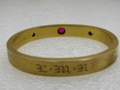 Victorian 10kt Ruby & Diamond Hinged Bangle Bracelet 7". LMR Engraved: Victorian 10kt Ruby & Diamond Hinged Bangle Bracelet 7". Monogrammed LMR on the opposite side from the stones. 8.5mm wide. It is marked on the inside slide and signed but cannot make out the mark. Wei