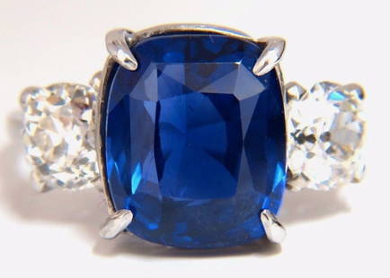 AGL Certified 9.23ct Natural No Heat Sri Lanka Sapphire Diamond Ring Platinum+: No heat / Classic Three AGL Certified 7.63ct. Natural Blue No heat Sapphire ring. Report #: CS82388 Cushion cut: 11.25 X 9.44 X 7.12mm Transparent, Blue Sri Lanka Origin 1.60ct. Side natural diamonds