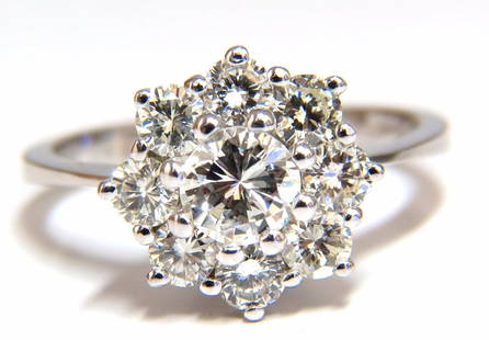 1.40ct diamonds raised cluster ring 14kt +: 1.40ct. Natural round diamonds cluster ring. Rounds & Full cut Brilliants H-color Vs-2 Si-1 clarity. Center: 4.6mm 14Kt White gold. 2.8 Grams Deck of ring: 11.2mm Depth: 7mm size 5.25 Resizing