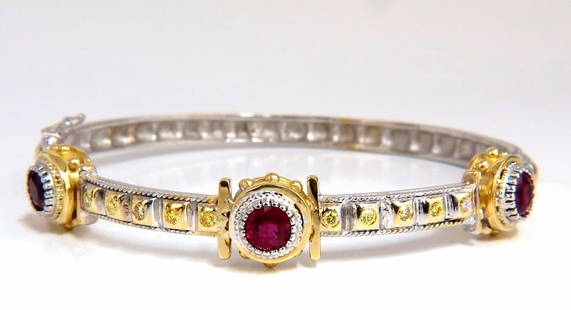 2.23 Natural Ruby Yellow Diamond Bangle Bracelet 14kt Spanish / Gothic Deco: Gothic Stud / Spanish Revival. 2.00ct. Natural Ruby Bangle bracelet. Round cuts, Fully Faceted. Vibrant Red, excellent Sparkle. Clean Clarity & Transparent. Average: 4.5mm 3 Rubies. .23ct. natural fan