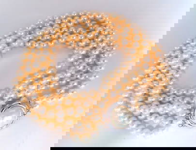 6.75 mm natural Japanese pearl & mabe Pearl 14 karat necklace: 6.75 mm natural Japanese pearls necklace. Three stranded cream off white color. AAA clarity 15 mm mabe Pearl 20 mm clasp $6,000 appraisal certificate to accompany ....*. Reserve: $2,400.00 Shippi
