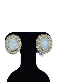 Vintage 14k Opal Diamond Earrings: Details Vintage from before 2000 Materials: Gold Gemstone: Opal Closure: Lever back Style: Mid-century Description Solid 14k yellow gold Genuine oval shaped opals bezel set Tiny diamonds set in o