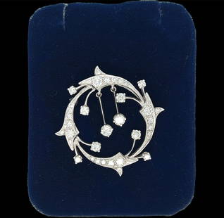 Vintage 14k white gold Diamond Circle Pin Brooch/Pendant: Details Vintage from the 1950s Width: 1 1/2 Inches Materials: Gold Gemstone: Diamond Description Vintage 14k white gold diamond brooch pin necklace Circle flowing design with 2 1/4 tcw diamonds G vs2
