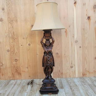 Antique Hand Carved Walnut Figural Lamp with Shade: Vintage from the 1920sMaterials: WoodWidth: 7 inchesHeight: 47 inchesDepth: 5 inches Description: Antique Hand Carved Walnut Figural Lamp with Shade This antique figural hand carved lamp is made of